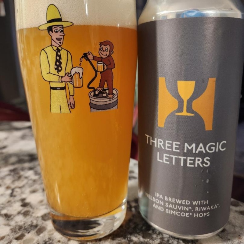 Hill Farmstead: 24 cans Three Magic Letters. Brewed fresh and cold on 3/1/26. Free Hill Farmstead mug to the winner!